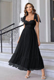 Leely Women A Line Black Prom Dress with Bow Spaghetti Straps Black Pleated Sweetheart Long Wedding Guest Dress