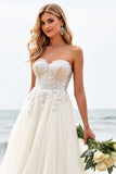 Ivory Sweep Train Strapless Ball Gown Wedding Dress with Appliques