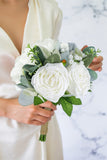 White Hand Holding Bridal Bouquet