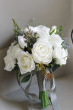 White Hand Holding Artificial Bridal Bouquet