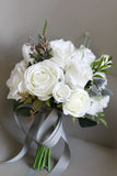White Hand Holding Artificial Bridal Bouquet